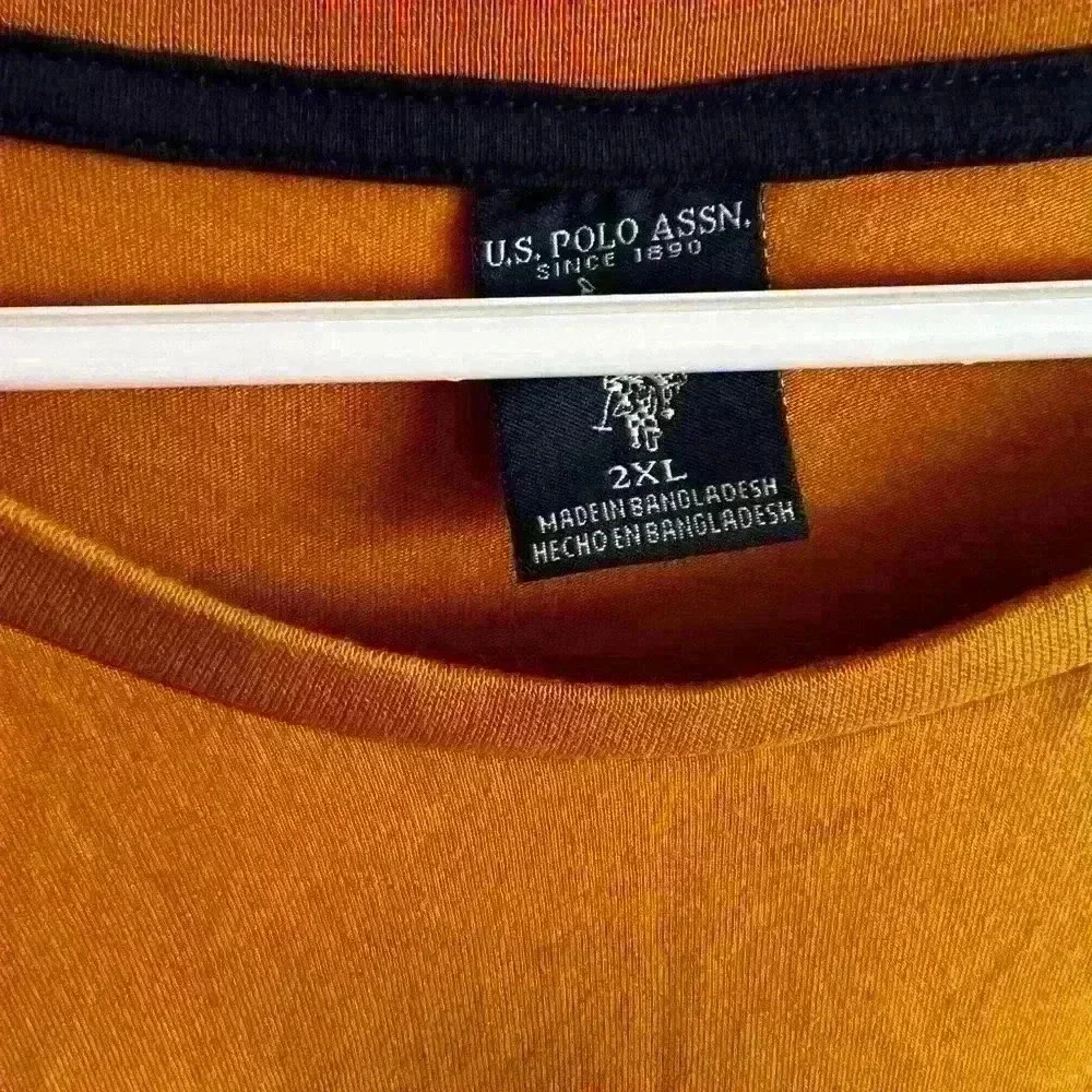 Mens mustard color long sleeve U.S. Polo Assn stop